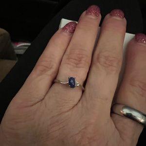 Lindy Blue Sapphire Star ring.  Stamped 10k.